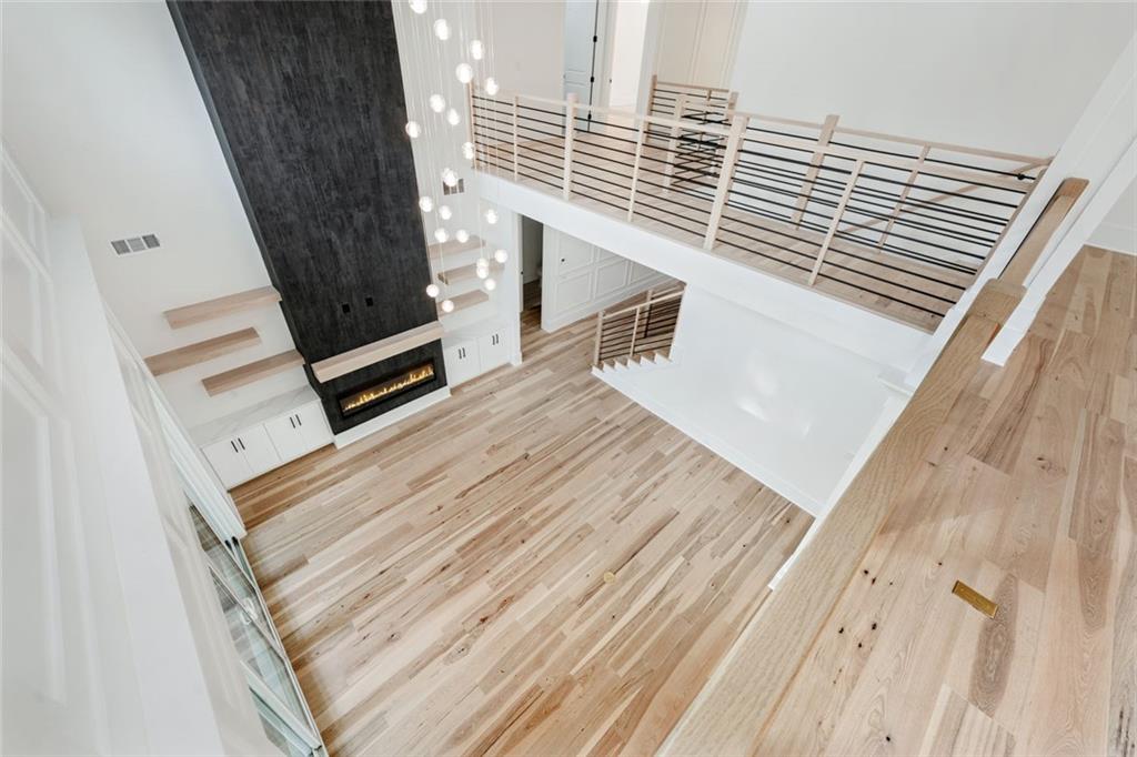 876 Bramlett Shoals Road Lawrenceville, GA 30045 - Photo 32 of 64 a view of a balcony with floor to ceiling window