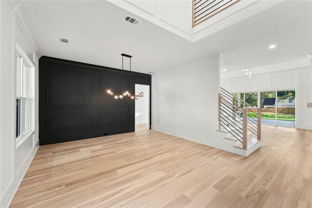 876 Bramlett Shoals Road Lawrenceville, GA 30045 - Photo 5 of 64 a view of livingroom with wooden floor