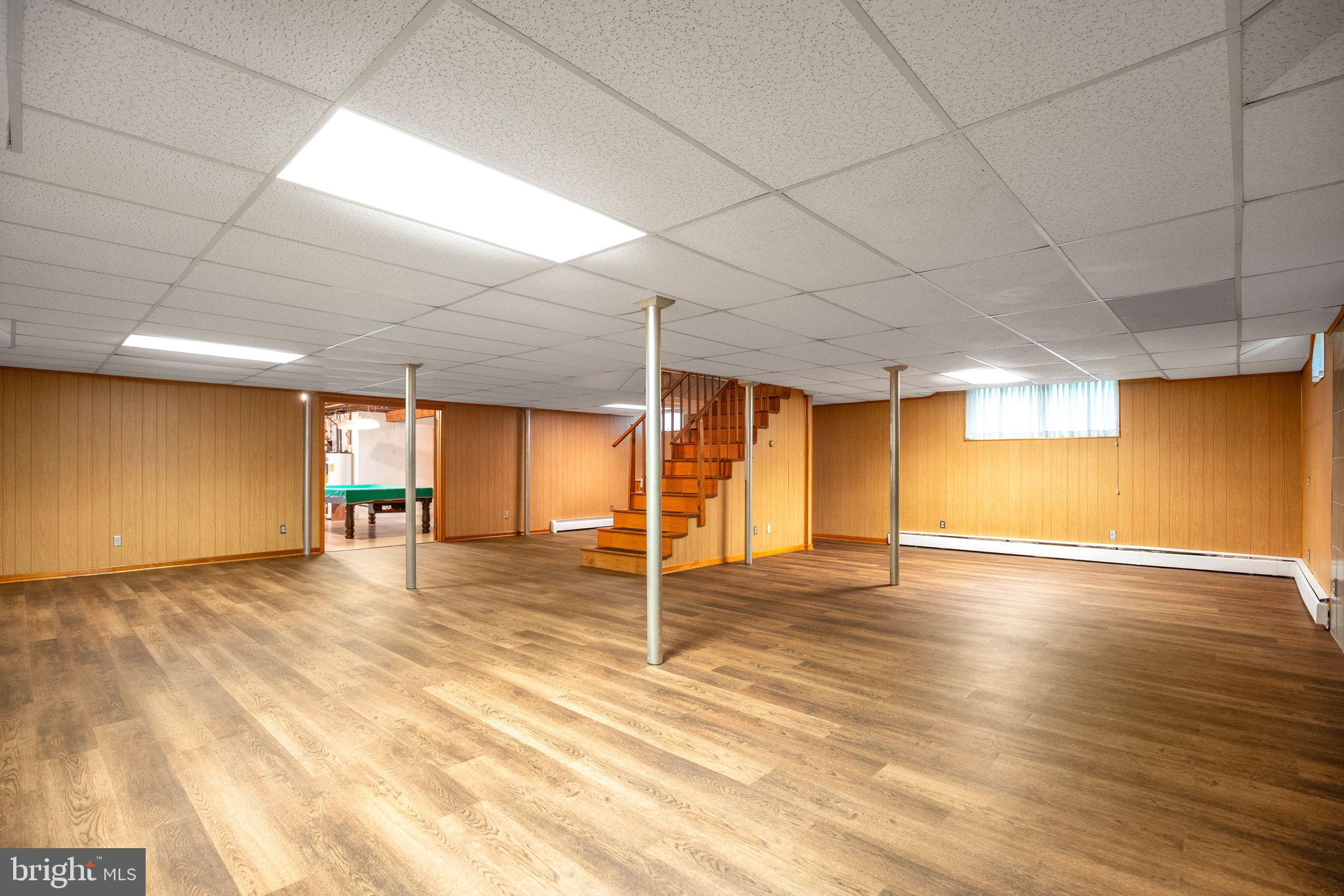 45382 Sypher Road California, MD 20619 - Photo 33 of 58 Lower level with view to unfinished side of the ba