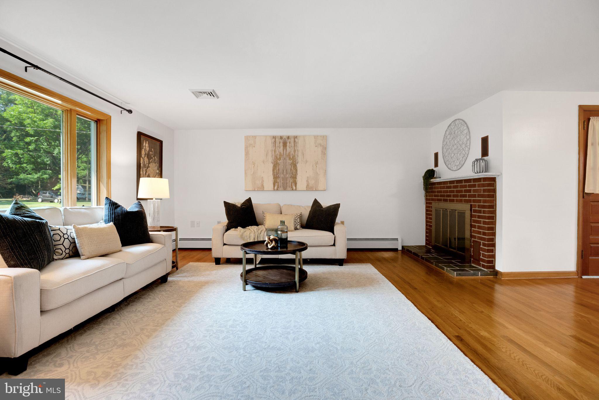 45382 Sypher Road California, MD 20619 - Photo 7 of 58 Living room with wood burning fireplace
