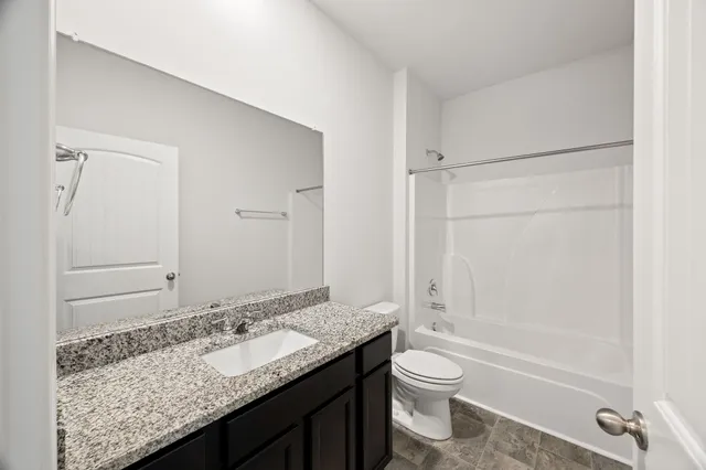 a view of storage and utility room with washer and dryer