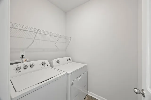 a view of a front of house with a yard