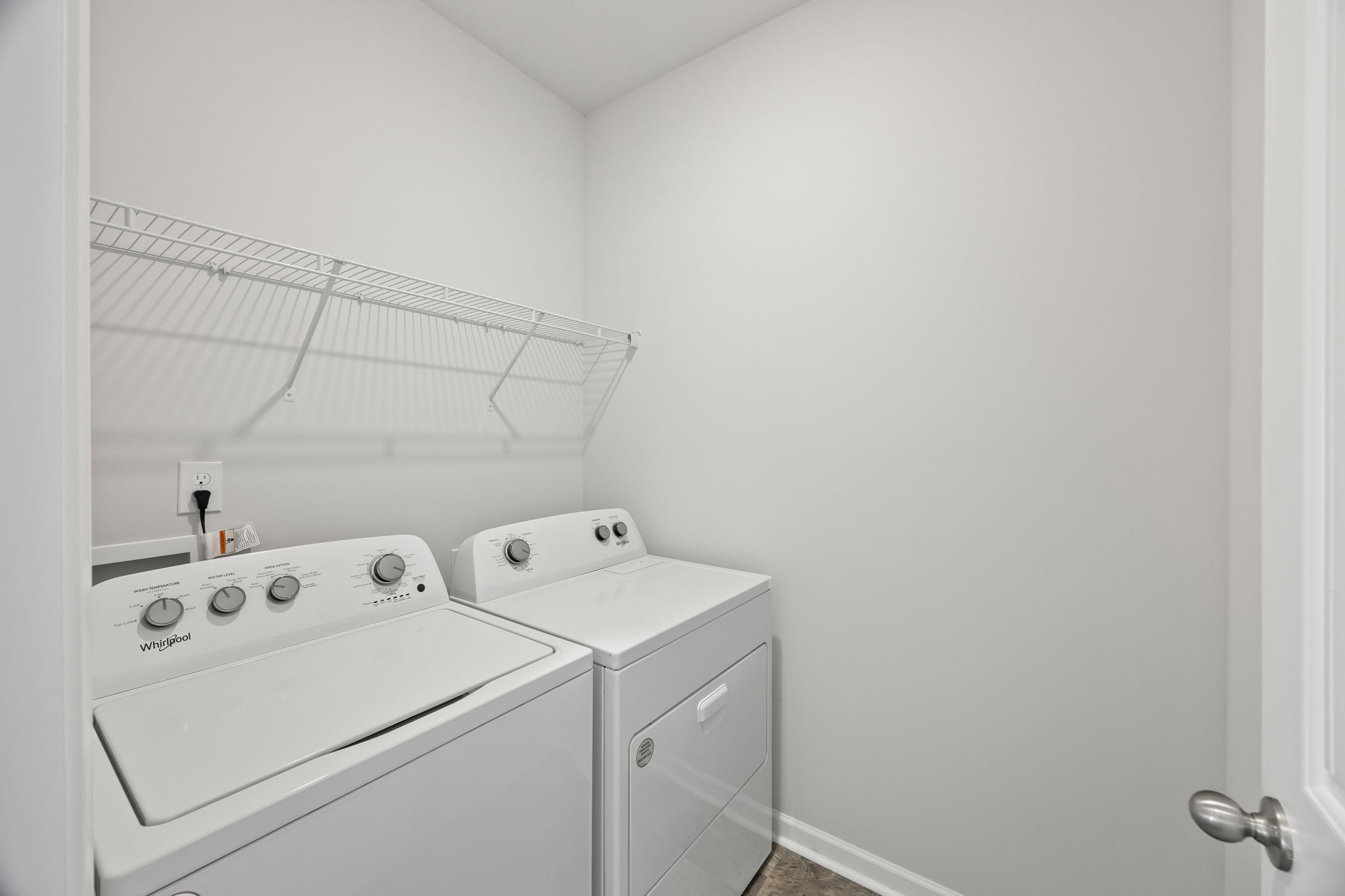 312 Oliver Way Baxter, TN 38544 - Photo 20 of 33 a view of storage and utility room with washer and dryer