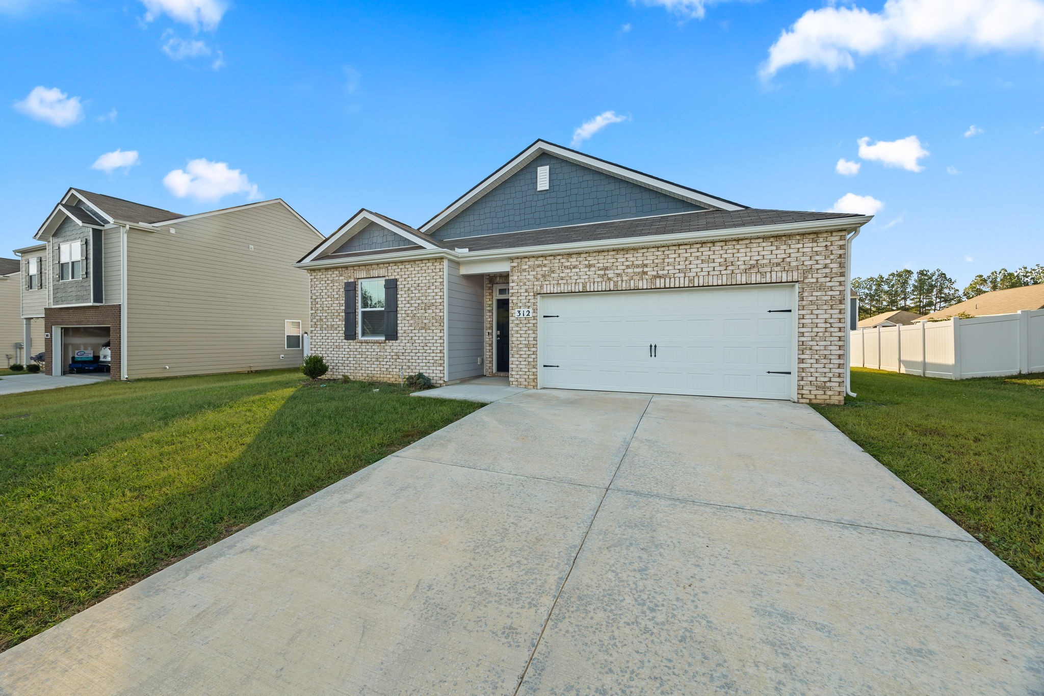 312 Oliver Way Baxter, TN 38544 - Photo 23 of 33 a view of a house with a yard