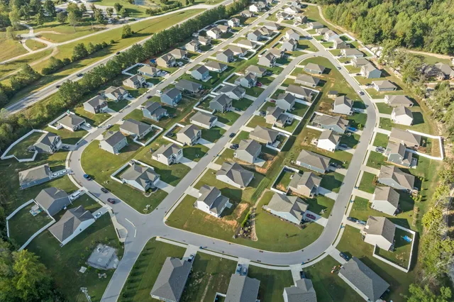 a view of lake with green space