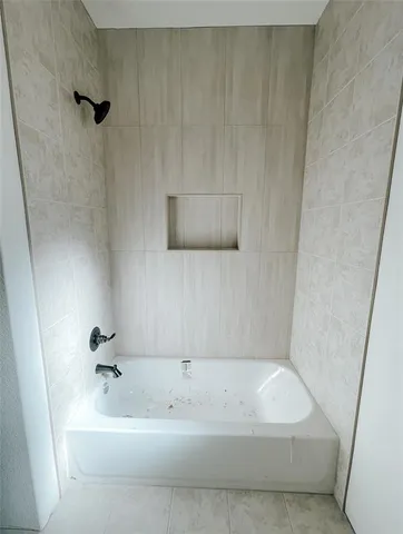 a bathroom with a bathtub