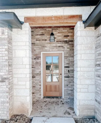 a front view of a building with glass door