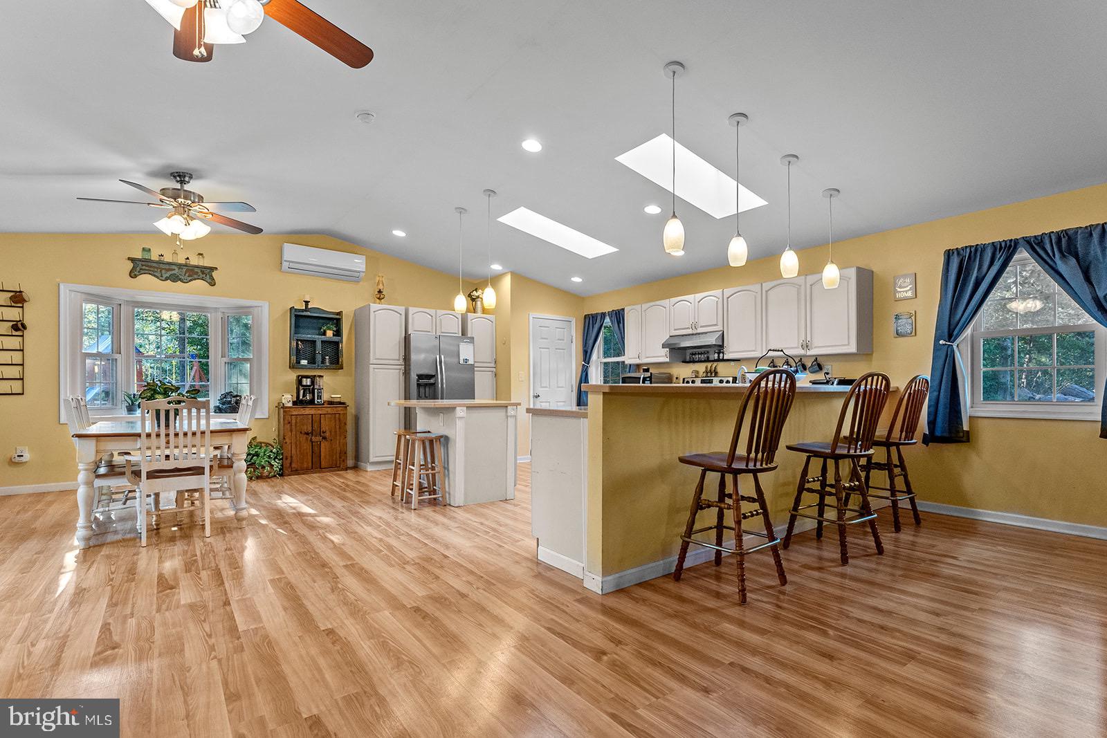 12483 Newland Road Warsaw, VA 22572 - Photo 6 of 38 Vaulted Ceiling in Kitchen