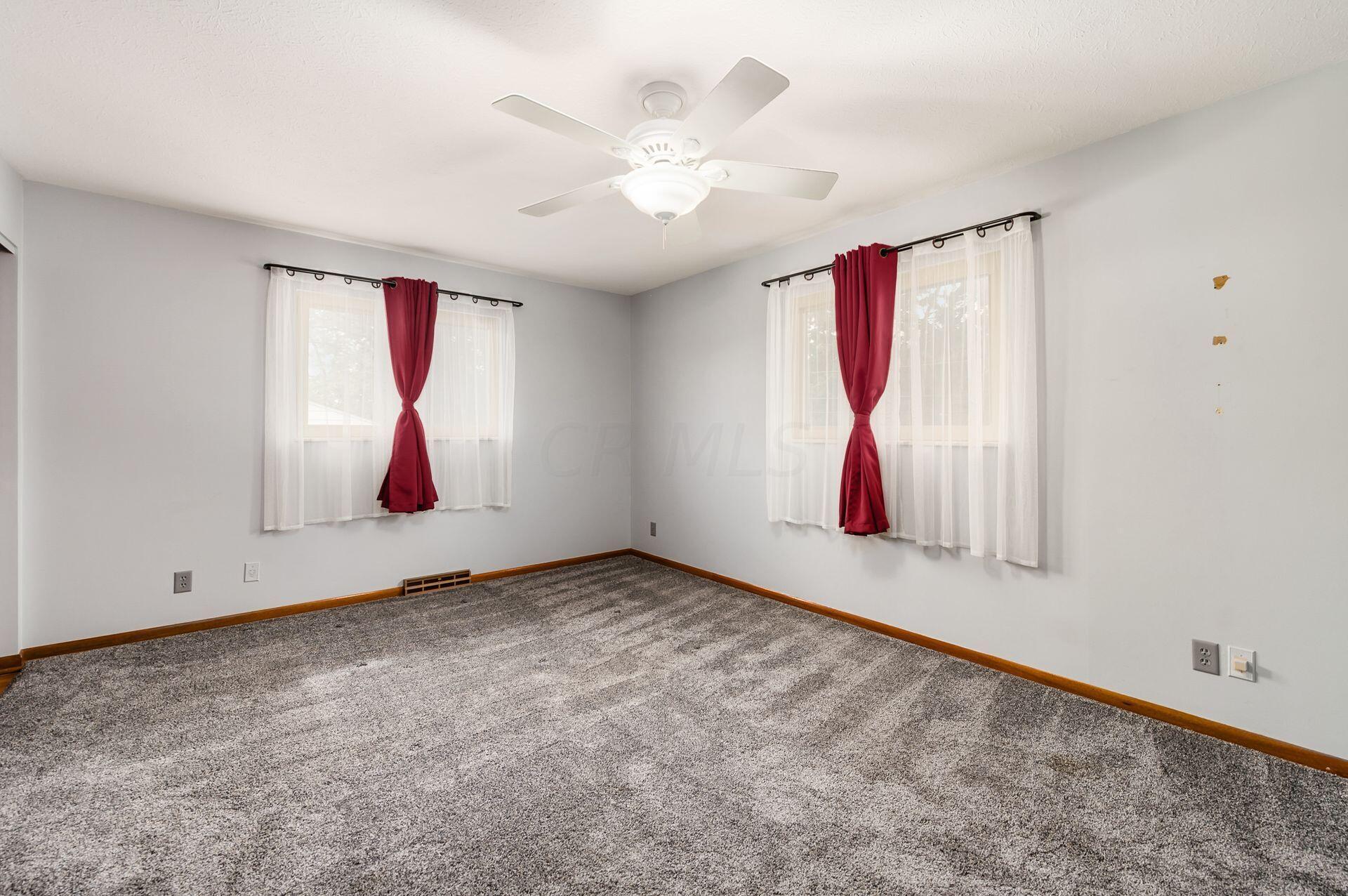 5355 Karl Road Columbus, OH 43229 - Photo 20 of 39 BEDROOM 1 WITH HARDWOOD FLOORS UNDER CARPET