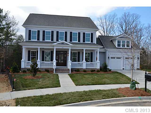 361 Olmstead Street Fort Mill, SC 29708 - Photo 1 of 16 a front view of a house with a yard