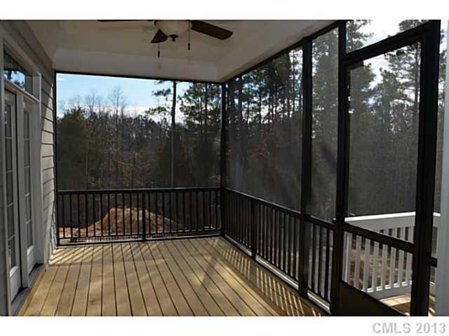 361 Olmstead Street Fort Mill, SC 29708 - Photo 15 of 16 a balcony with wooden floor