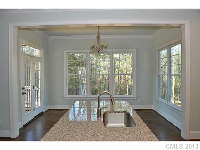 361 Olmstead Street Fort Mill, SC 29708 - Photo 5 of 16 a black and white photo of a living room