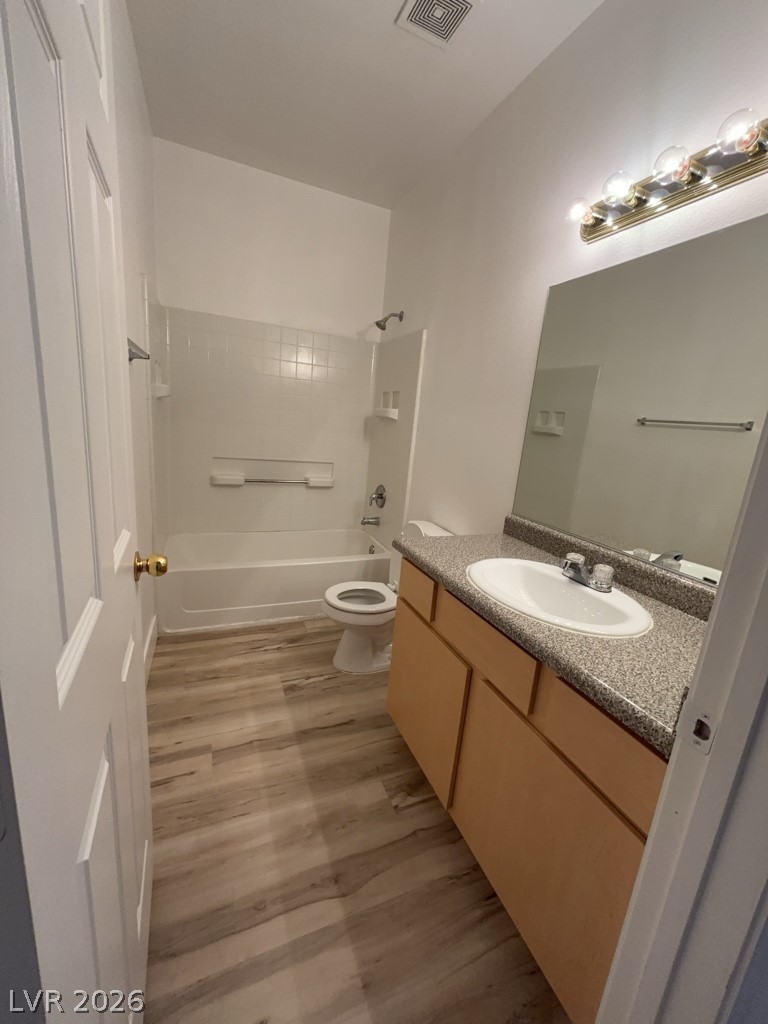 4915 East Russell Road, Unit 143 Las Vegas, NV 89120 - Photo 10 of 10 A well-lit bathroom provides a functional vanity and bath.