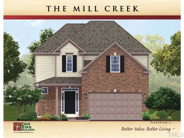 2521 Shepherd Valley Street Raleigh, NC 27610 - Photo 1 of 5 a front view of a house with a garden and garage