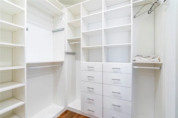 a view of an empty walk in closet