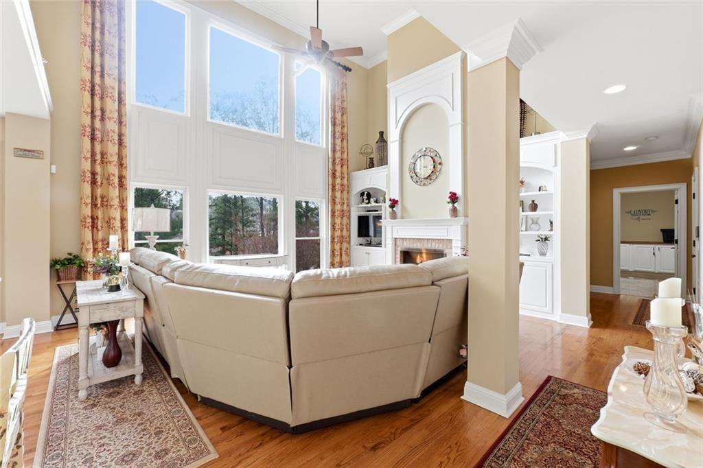 1915 Brackendale Road Northwest Kennesaw, GA 30152 - Photo 12 of 69 a living room with furniture and a large window