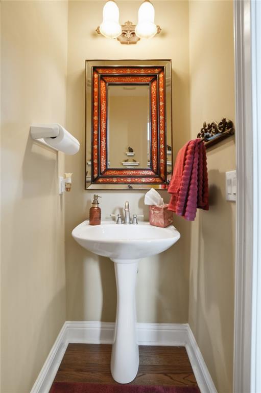 1915 Brackendale Road Northwest Kennesaw, GA 30152 - Photo 17 of 69 a bathroom with a sink and a mirror
