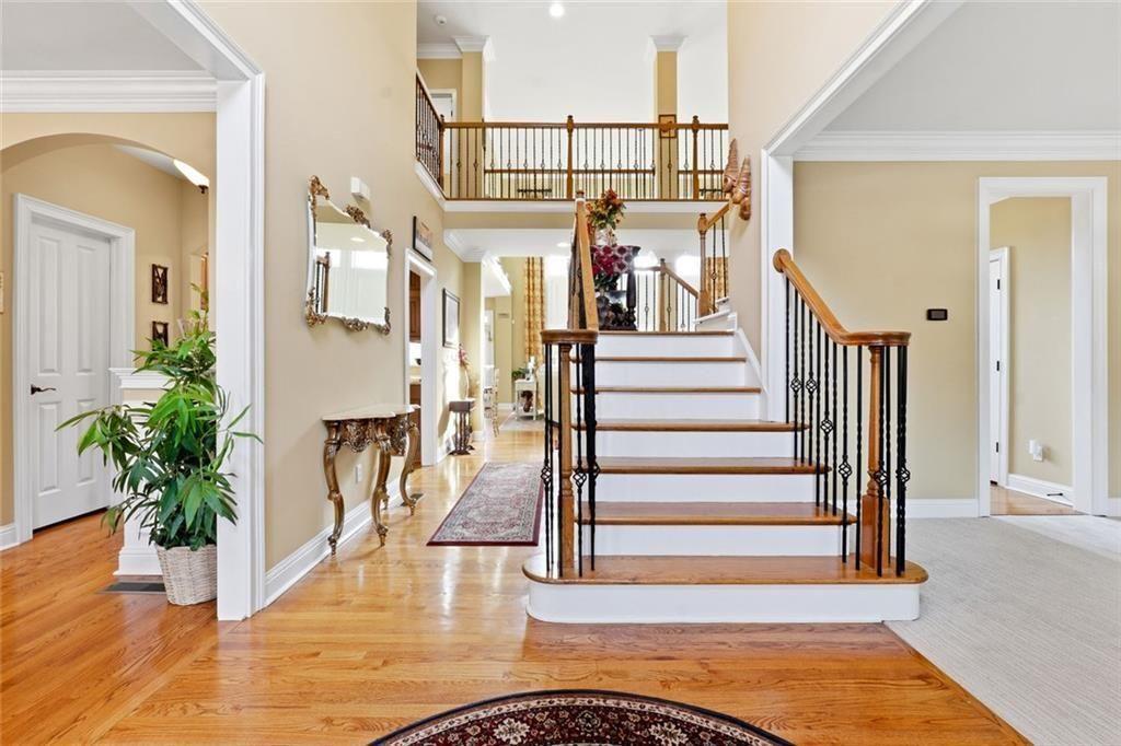 1915 Brackendale Road Northwest Kennesaw, GA 30152 - Photo 2 of 69 a view of entryway and hall with wooden floor
