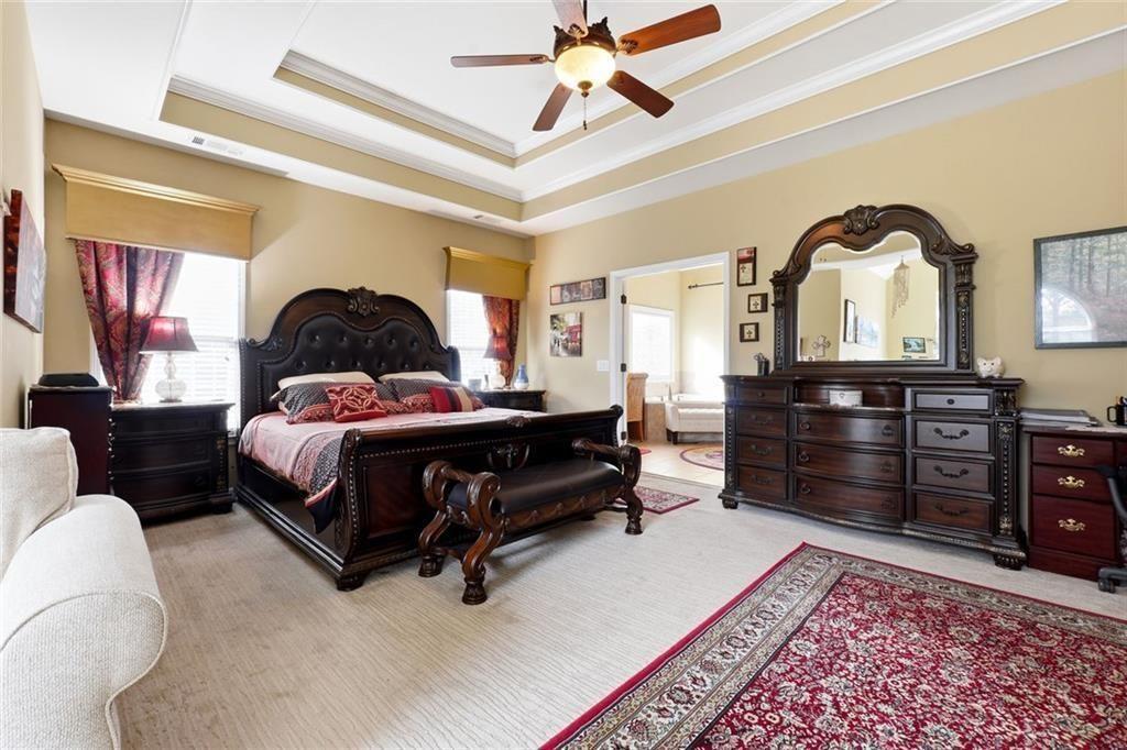 1915 Brackendale Road Northwest Kennesaw, GA 30152 - Photo 24 of 69 a bedroom with a bed and a dresser