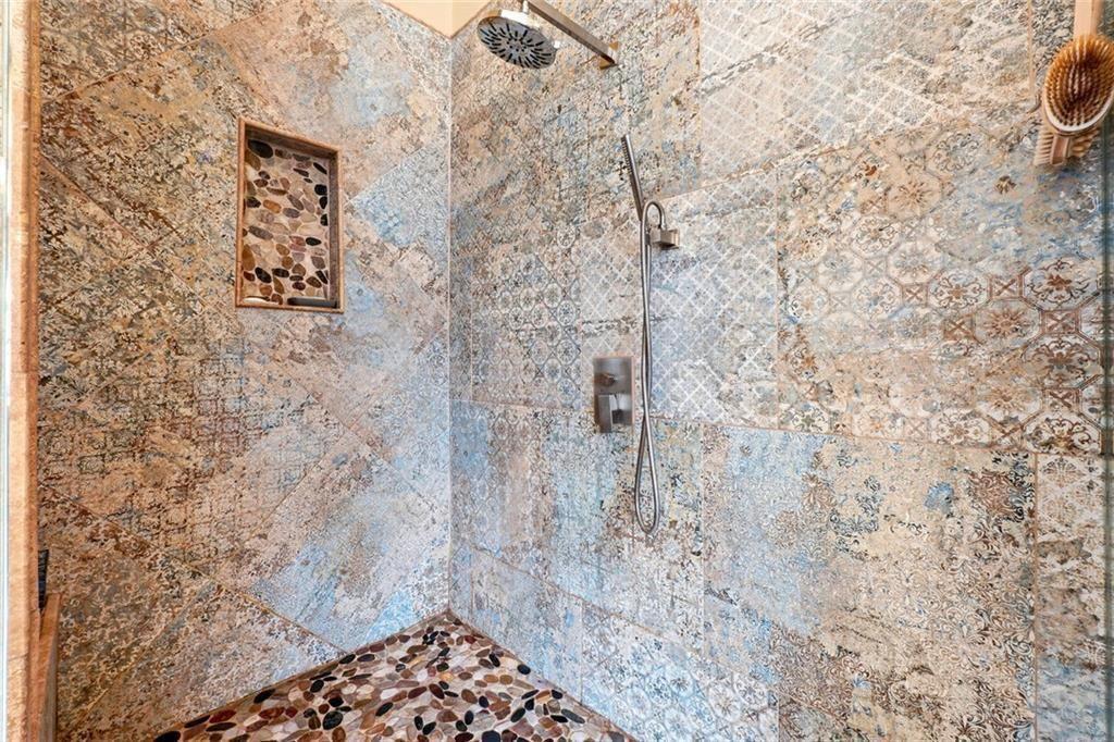 1915 Brackendale Road Northwest Kennesaw, GA 30152 - Photo 27 of 69 a bathroom with a shower