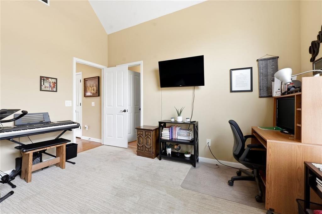 1915 Brackendale Road Northwest Kennesaw, GA 30152 - Photo 38 of 69 a view of a livingroom with workspace and a window