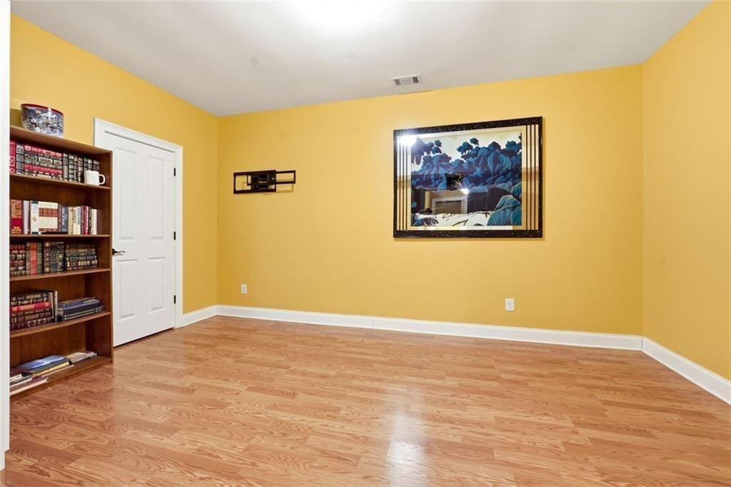 1915 Brackendale Road Northwest Kennesaw, GA 30152 - Photo 42 of 69 a view of an empty room with shelves
