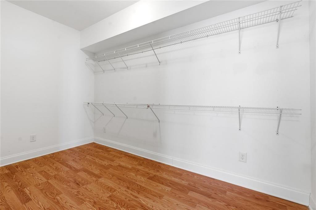 1915 Brackendale Road Northwest Kennesaw, GA 30152 - Photo 45 of 69 a view of a room with racks on the wall