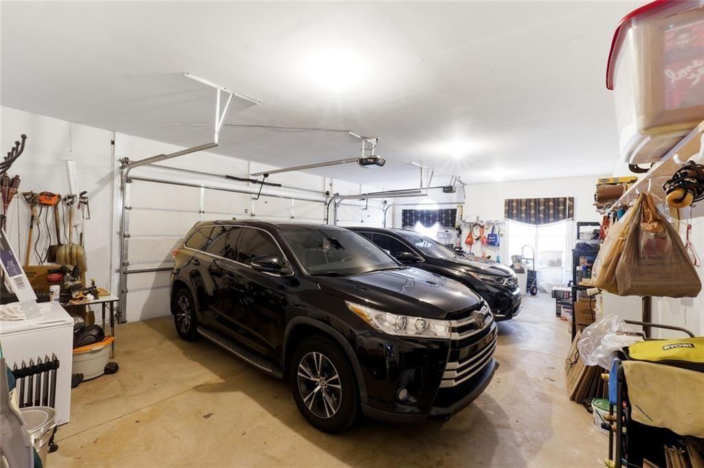 1915 Brackendale Road Northwest Kennesaw, GA 30152 - Photo 51 of 69 a car parked in a garage