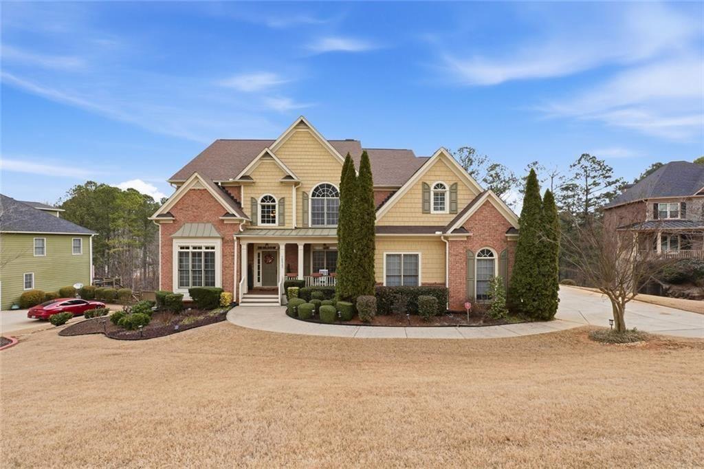 1915 Brackendale Road Northwest Kennesaw, GA 30152 - Photo 59 of 69 a front view of multiple houses with yard
