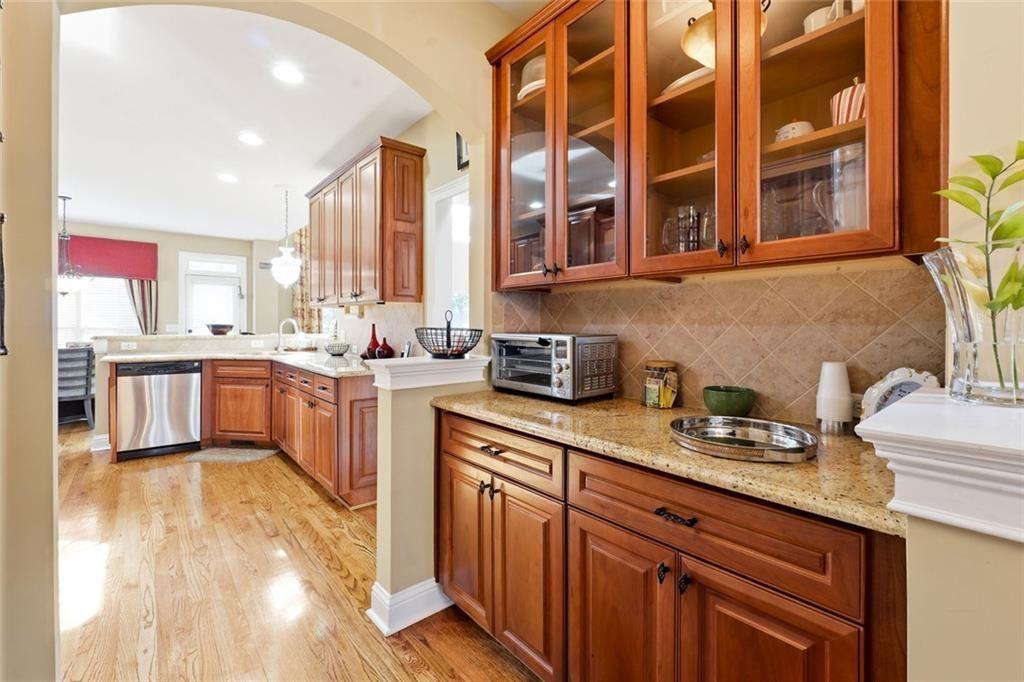 1915 Brackendale Road Northwest Kennesaw, GA 30152 - Photo 8 of 69 a kitchen with a sink cabinets and window