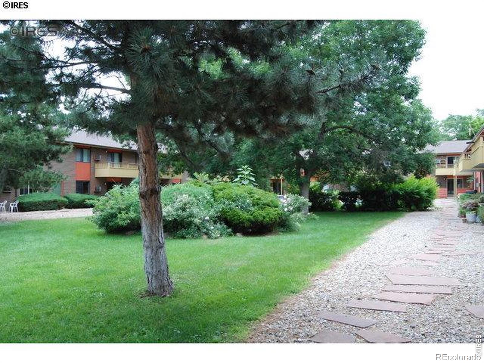 1895 Alpine Avenue, Unit G22 Boulder, CO 80304 - Photo 24 of 33 a view of a yard with plants and a fountain