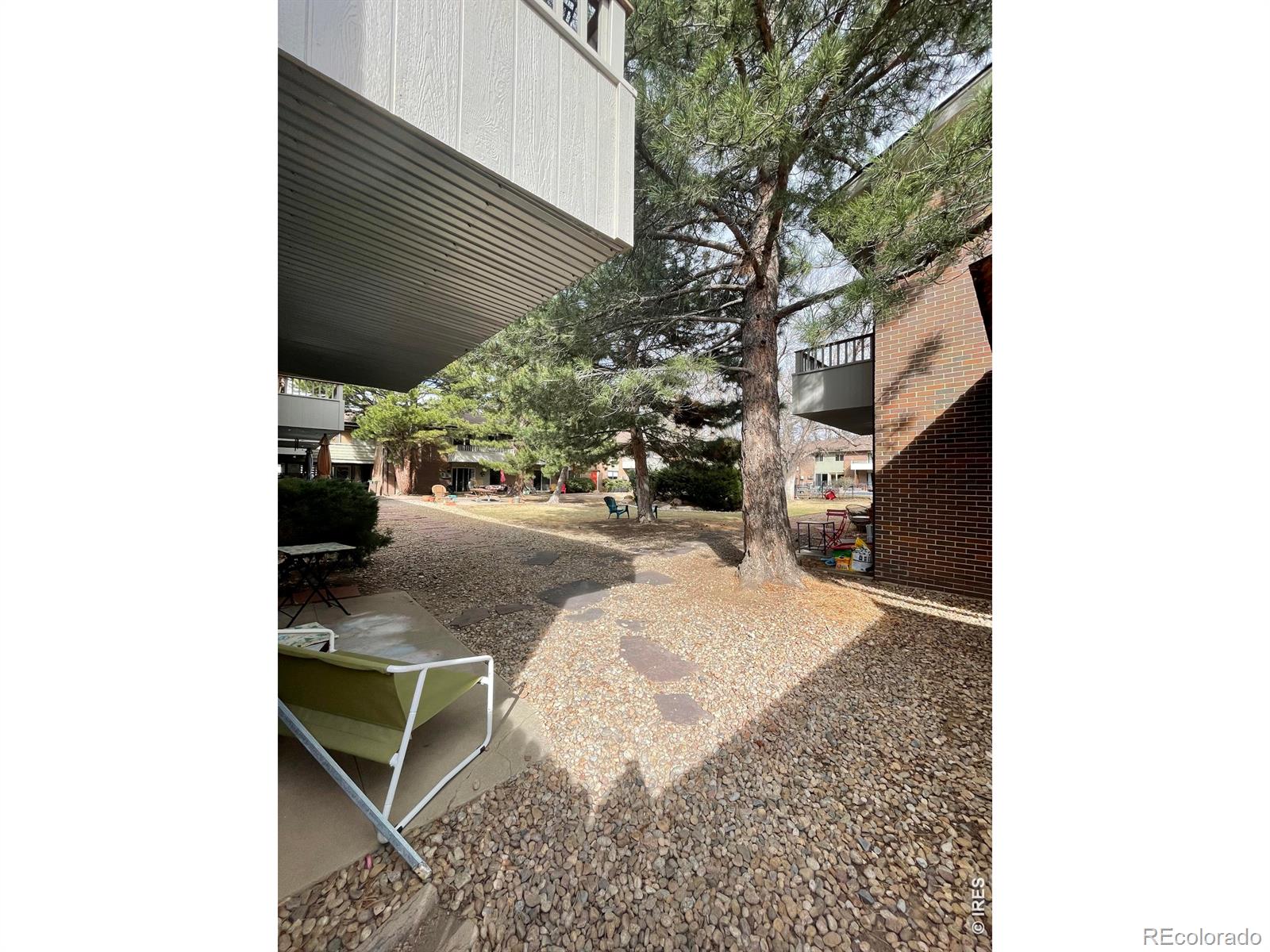 1895 Alpine Avenue, Unit G22 Boulder, CO 80304 - Photo 30 of 33 a terrace view with sitting space and trees