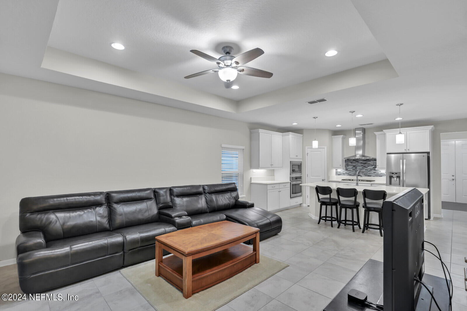 364 Beale Avenue St. Augustine, FL 32092 - Photo 15 of 54 a living room with furniture and kitchen view