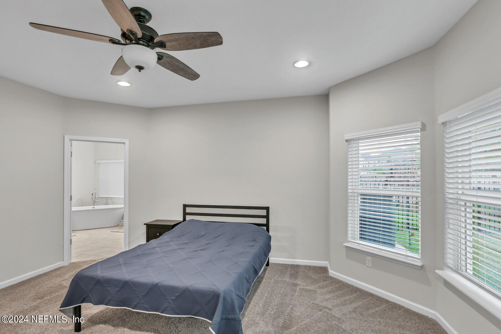 364 Beale Avenue St. Augustine, FL 32092 - Photo 18 of 54 a bedroom with a bed and a window