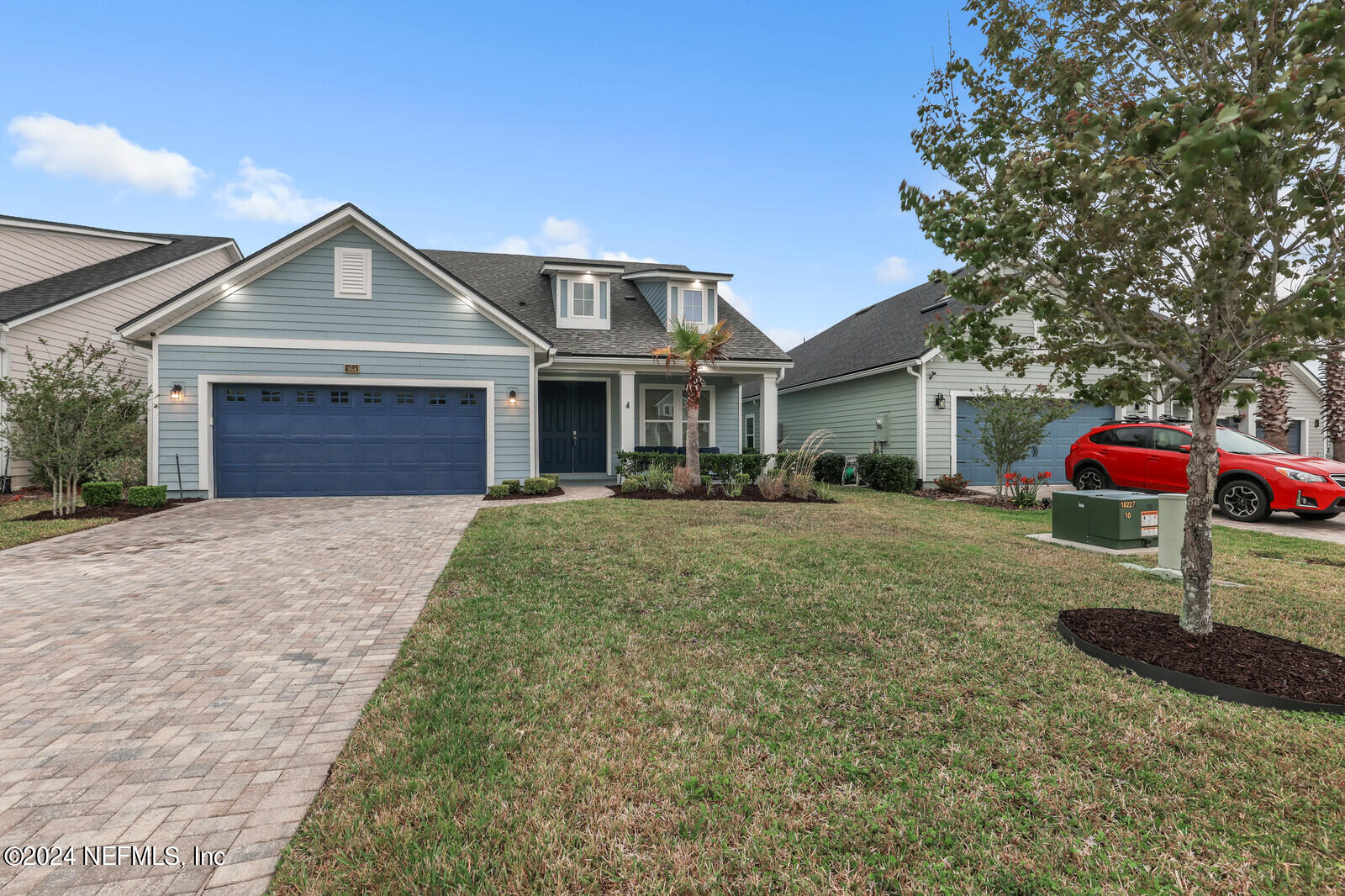 364 Beale Avenue St. Augustine, FL 32092 - Photo 2 of 54 a front view of a house with a yard and garage