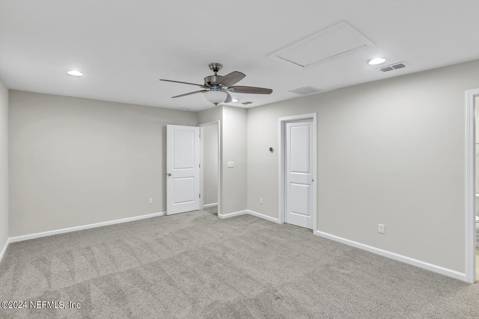 364 Beale Avenue St. Augustine, FL 32092 - Photo 26 of 54 a view of an empty room with a ceiling fan