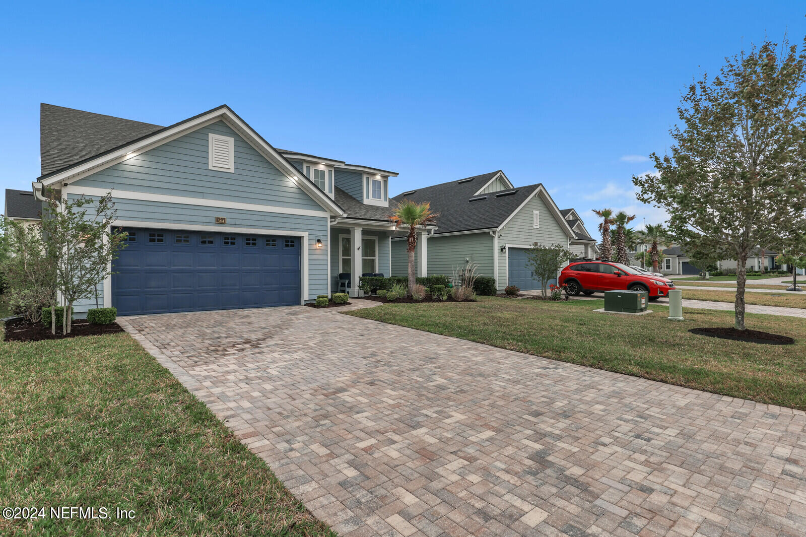 364 Beale Avenue St. Augustine, FL 32092 - Photo 36 of 54 a front view of a house with a yard and garage