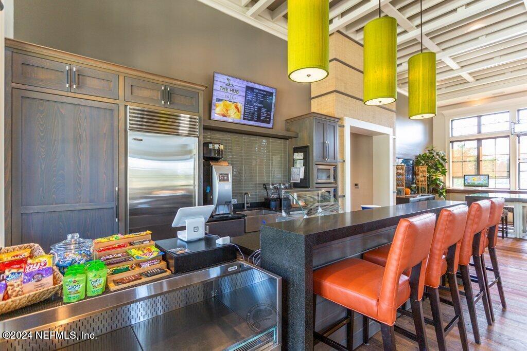 364 Beale Avenue St. Augustine, FL 32092 - Photo 45 of 54 a dining table chairs and a table in a room