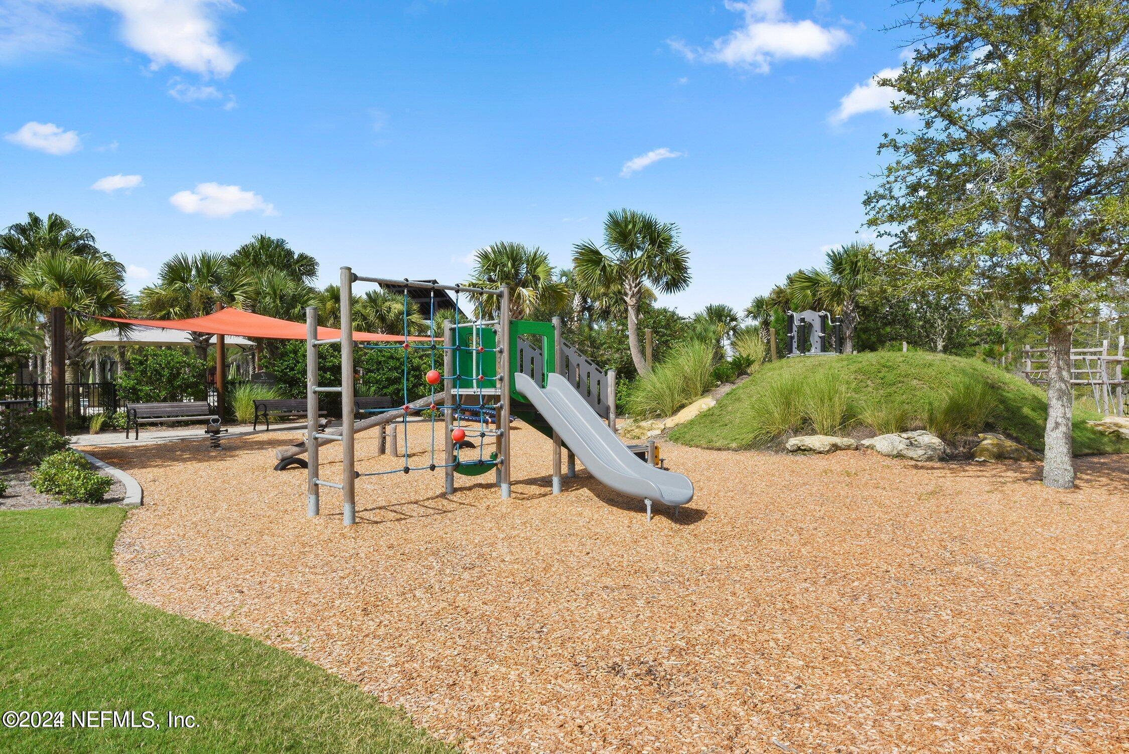 364 Beale Avenue St. Augustine, FL 32092 - Photo 49 of 54 a view of a park with swings and slides