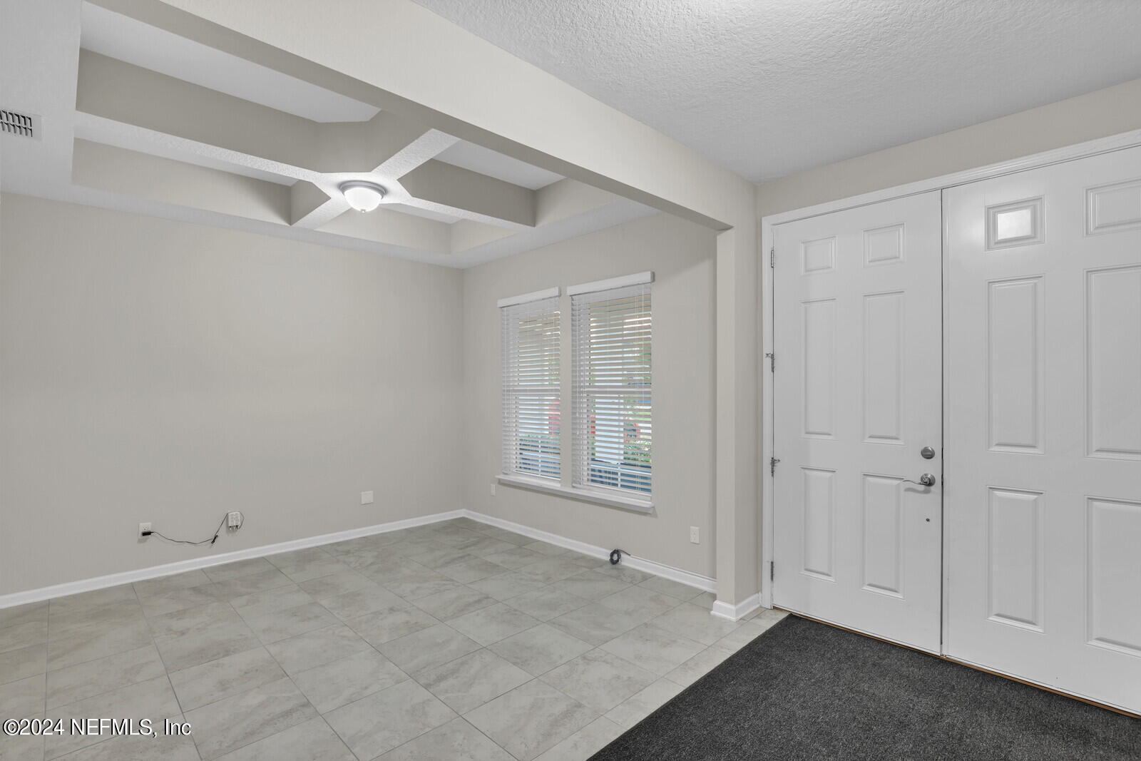 364 Beale Avenue St. Augustine, FL 32092 - Photo 5 of 54 a view of an empty room with a window