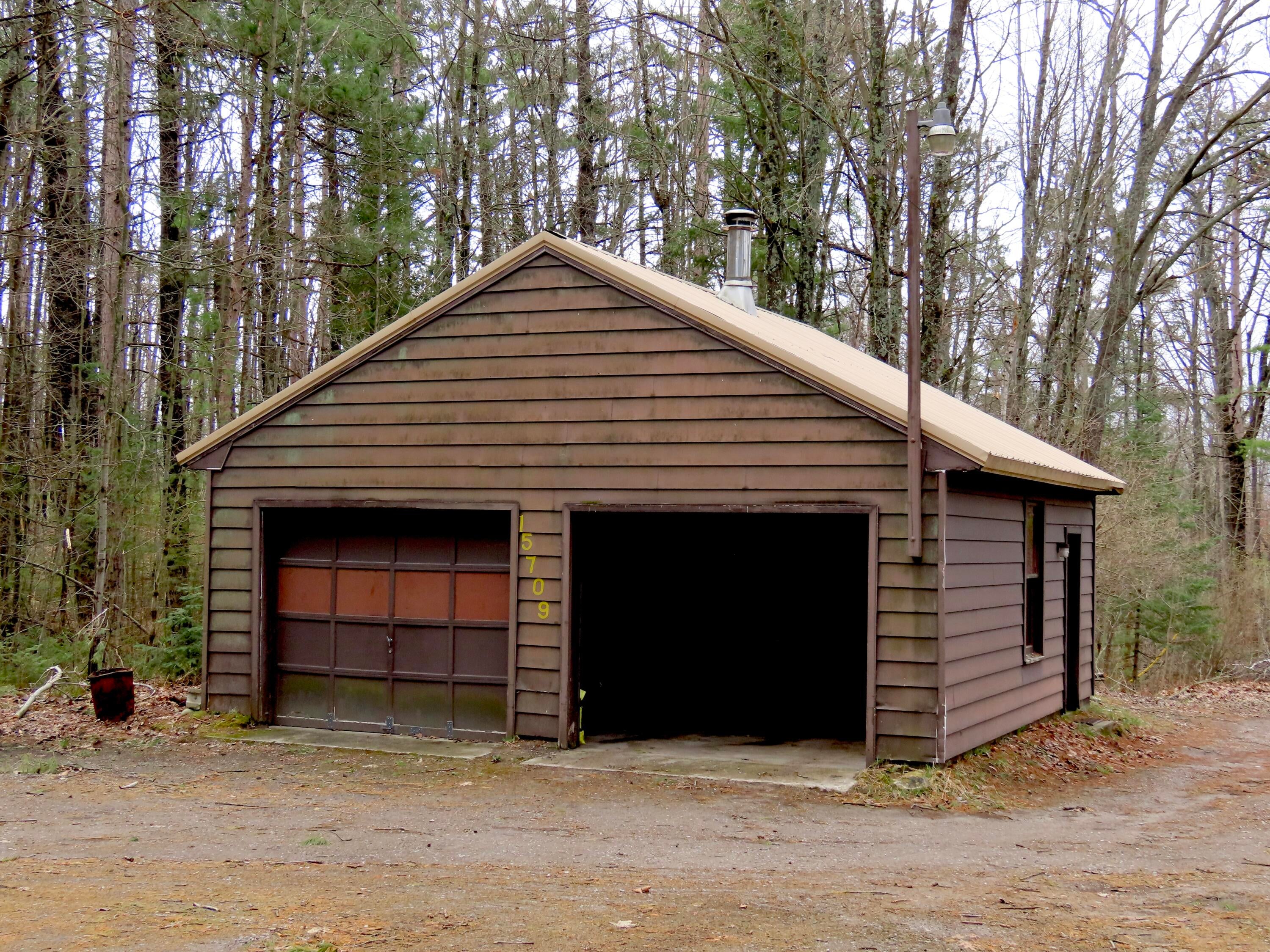 15709 Pleasant Valley Road Atlanta, MI 49709 - Photo 12 of 65 2 car garage