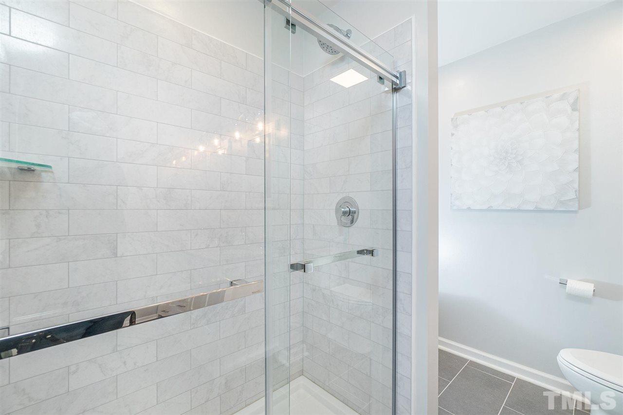 3 Bay Ridge Court Durham, NC 27713 - Photo 19 of 25 Beautiful tile work, walk in shower, and dual vanities!
