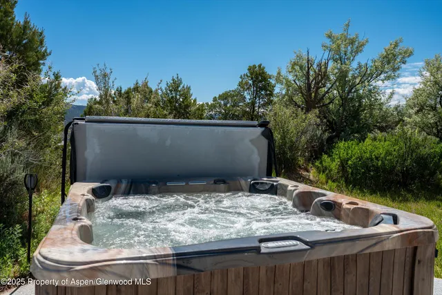a kitchen with a stove and a window