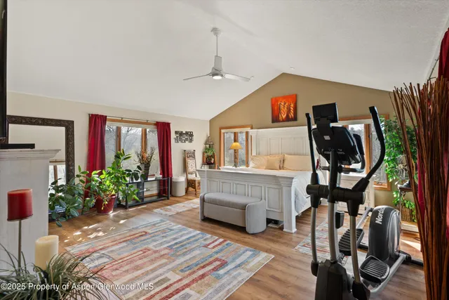 a view of a patio with a table and chairs