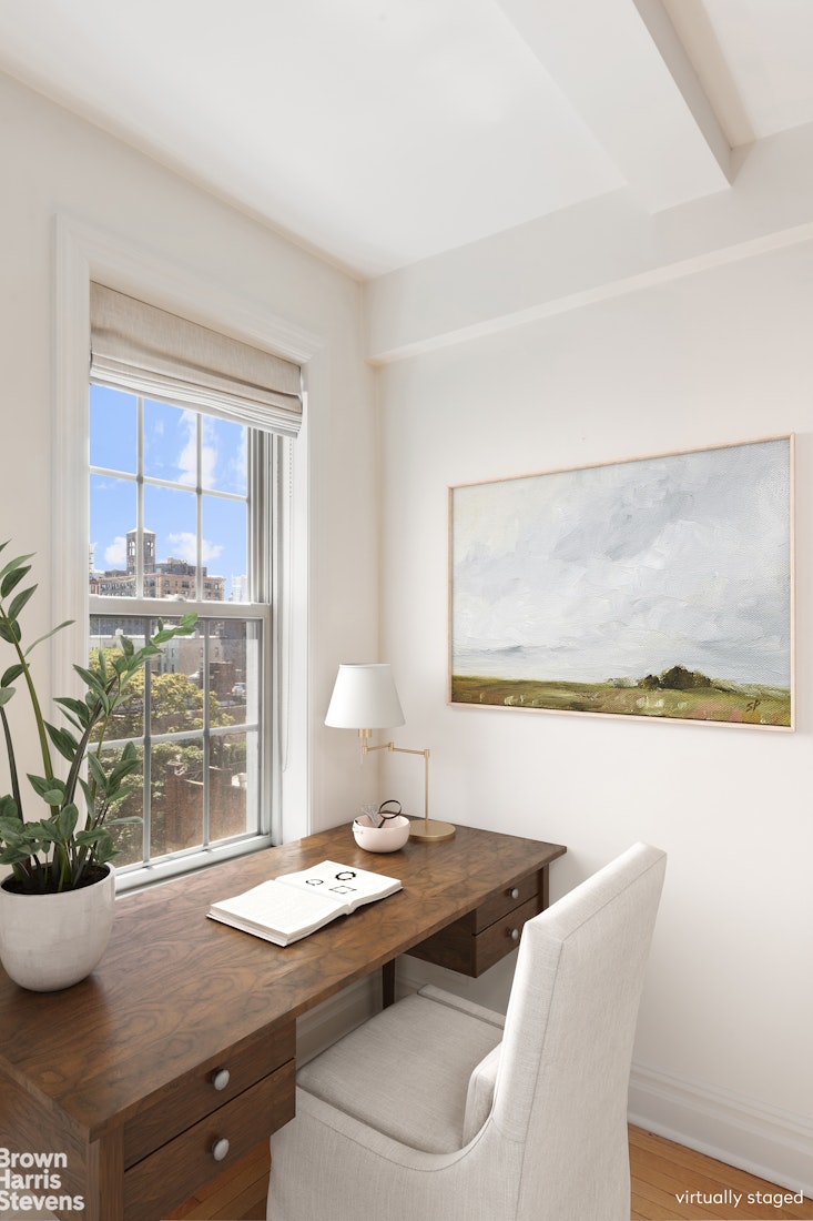 24 5th Avenue, Unit 909 Manhattan, NY 10011 - Photo 6 of 11 a living room with furniture and wooden floor
