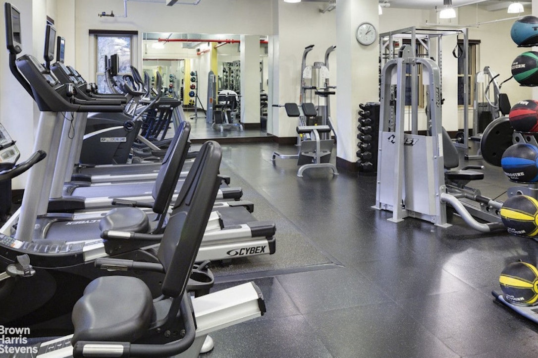 24 5th Avenue, Unit 909 Manhattan, NY 10011 - Photo 9 of 11 a view of a room with gym equipment