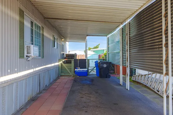 a view of a porch with furniture