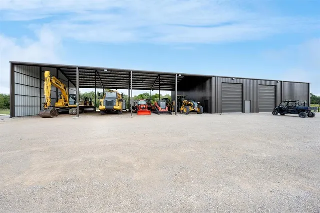a view of a table and chairs in the room