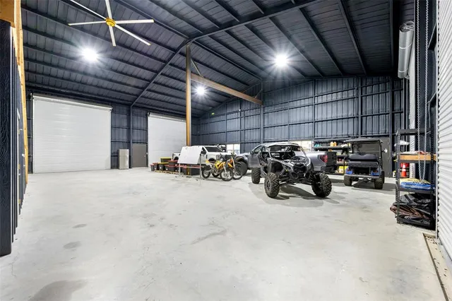 a view of a backyard with sitting area