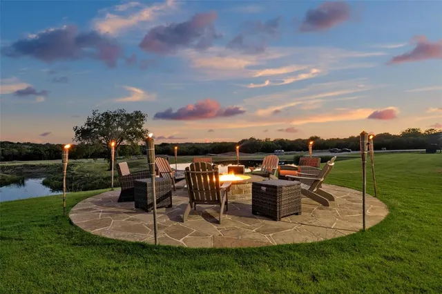 a view of a lake with a yard